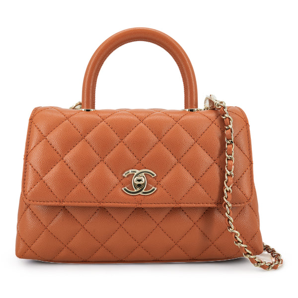 CHANEL Mini Coco Handle Flap Bag in 21A Brown Caramel Pumpkin Caviar - Dearluxe.com