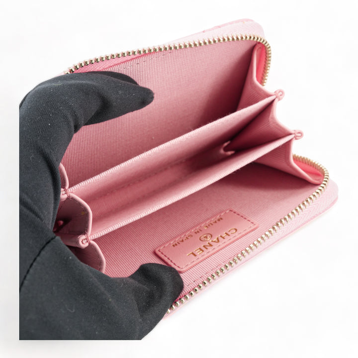 CHANEL Zippy Wallet Coin Purse in Pink Caviar - Dearluxe.com