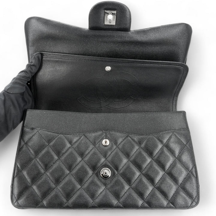 CHANEL Jumbo Classic Double Flap Bag in 18C Iridescent Black Caviar - Dearluxe.com