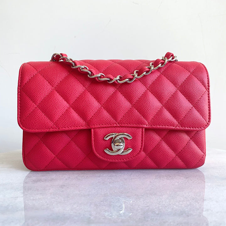 Superb Chanel Mini Timeless Flap bag handbag in pink caviar