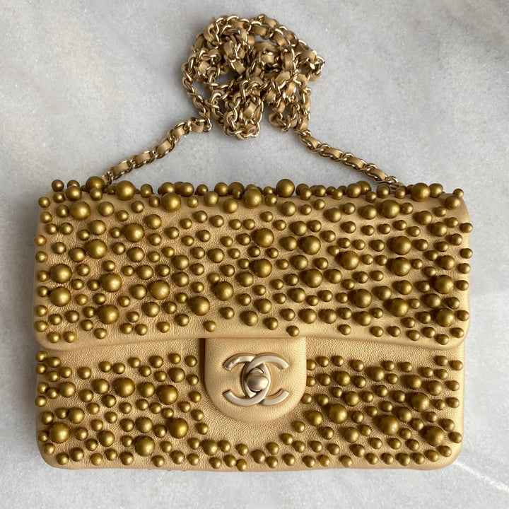 CHANEL Gold Pearl Lambskin Mini Flap Bag