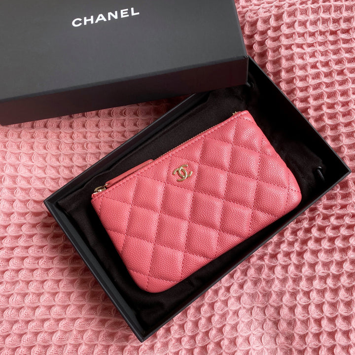 CHANEL Mini O Case Pouch in 19B Pink Caviar - Dearluxe.com