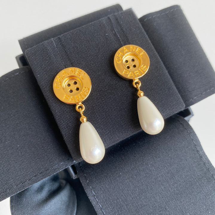 CHANEL 20A Gold Metal Button Pearl Dangle Earrings - Dearluxe.com