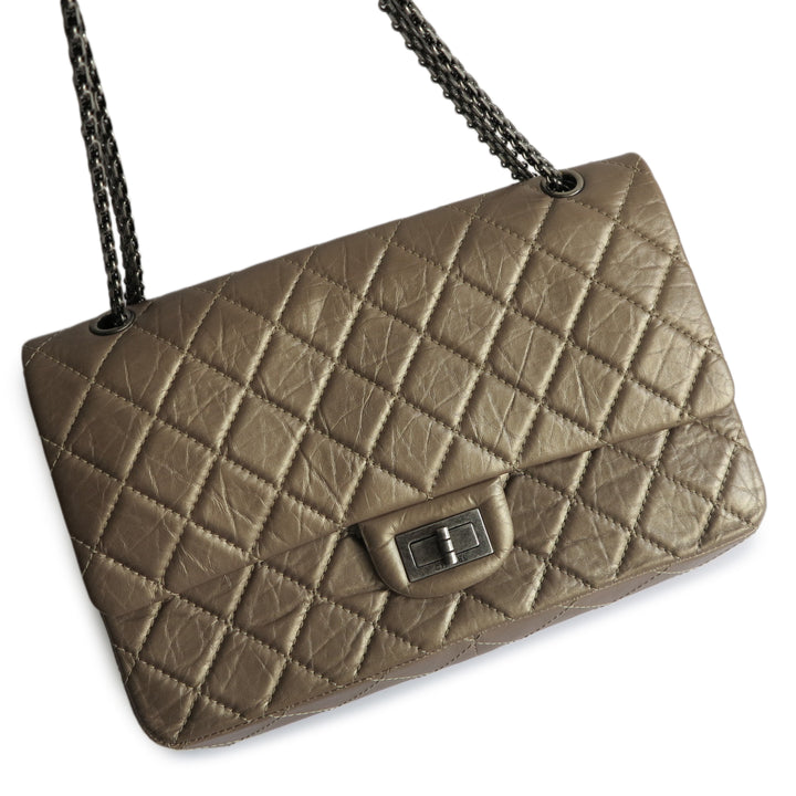 Maxi 2.55 handbag, Aged calfskin & gold-tone metal, black — Fashion