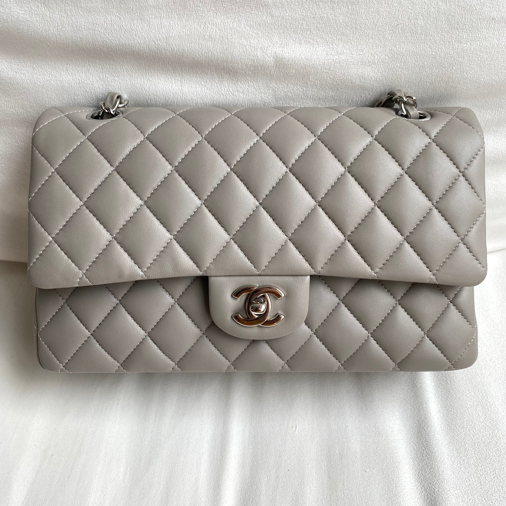 Which would you have chosen Regret purchasing lambskin mini top handle  r chanel