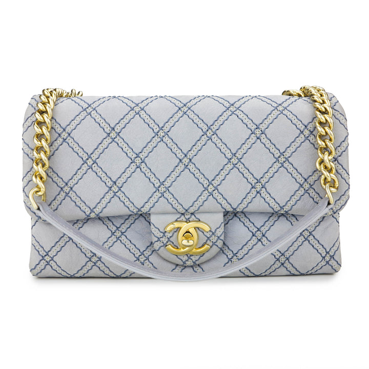 CHANEL Small Iridescent Flap Bag with Metallic Stitching - Dearluxe.com