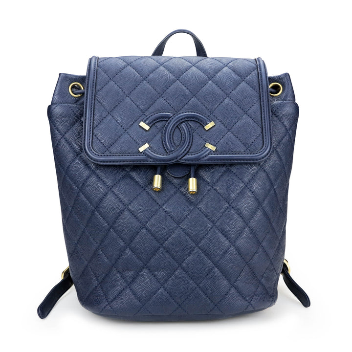 CHANEL Quilted Filigree Backpack in Navy Caviar - Dearluxe.com