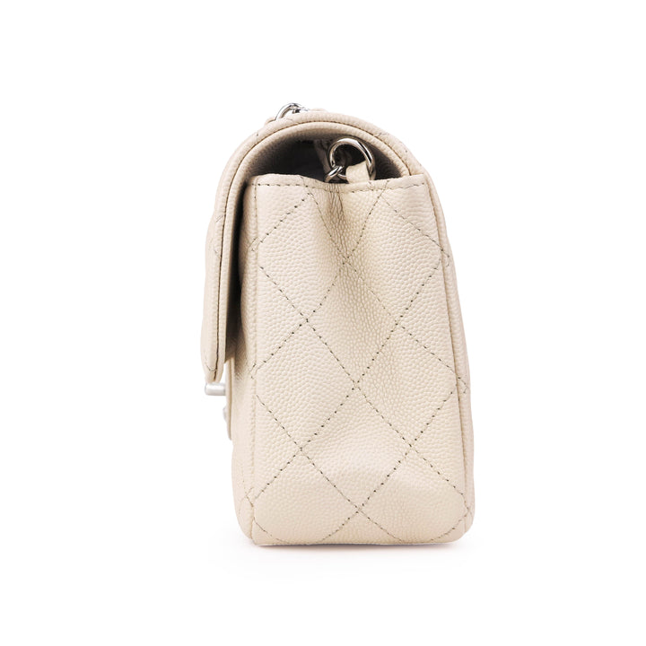 CHANEL Mini Rectangular Flap Bag in 18C Light Beige Caviar - Dearluxe.com