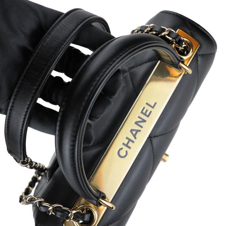 CHANEL Small Trendy CC Flap Bag with Top Handle in Black Lambskin - Dearluxe.com