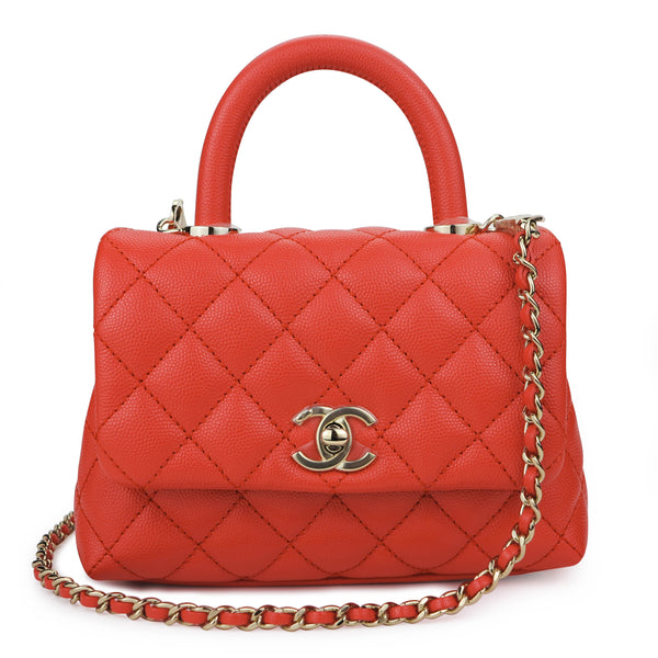 CHANEL Extra Mini Coco Handle Flap Bag in Coral Red Caviar - Dearluxe.com